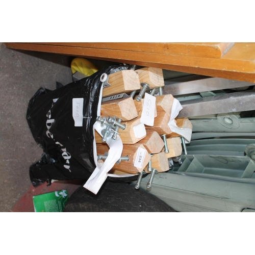 334 - BAG OF WOODEN TABLE LEGS