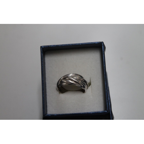 597 - 925 SILVER 6 RING, TWIST, SIZE N 1/2 - O