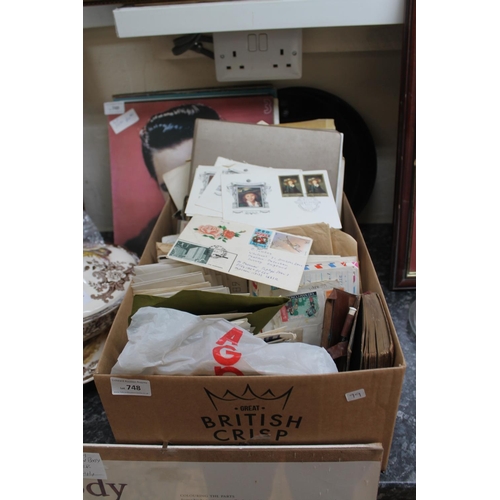 748 - LARGE BOX OF ENVELOPES AND STAMPS FROM VARIOUS COUNTRIES