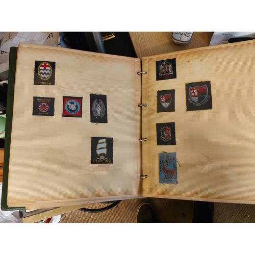 506 - FOLDER OF COLLECTABLE SCOUT BADGES