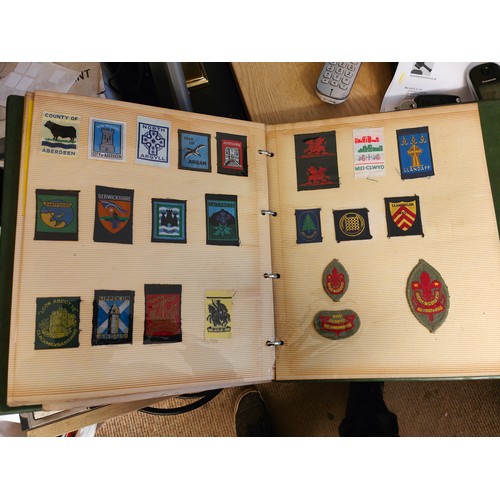 506 - FOLDER OF COLLECTABLE SCOUT BADGES