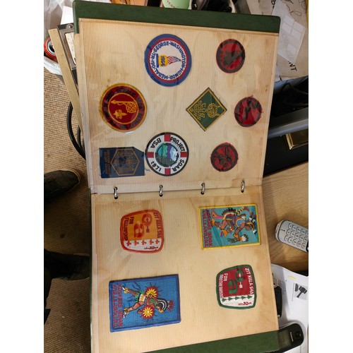 506 - FOLDER OF COLLECTABLE SCOUT BADGES