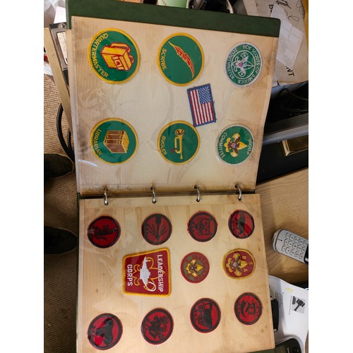 506 - FOLDER OF COLLECTABLE SCOUT BADGES