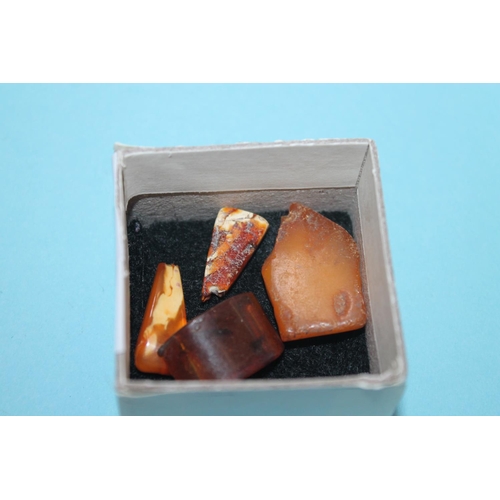 406 - 4 X PIECES OF REAL RAW AMBER