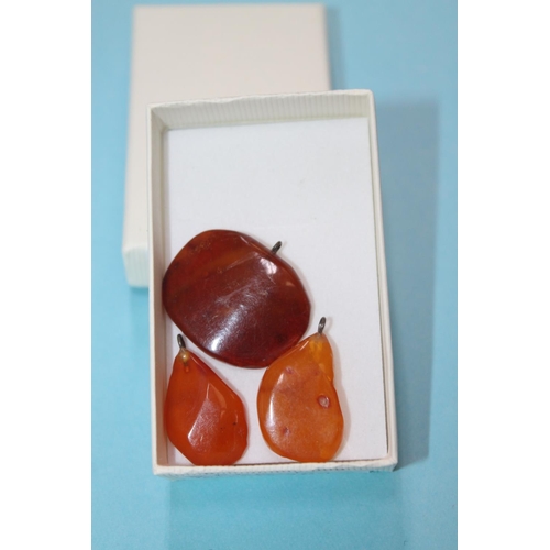 410 - 3 X REAL RAW AMBER PENDANTS