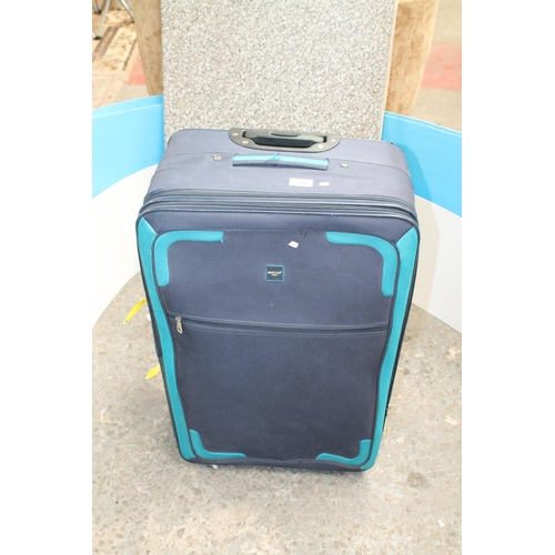 697 - BLUE WHEELED SUITCASE