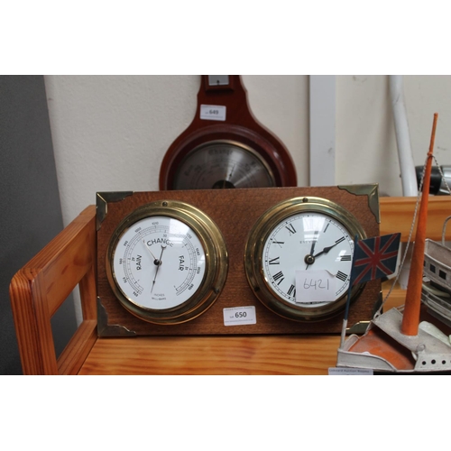 BRASS BAROMETER AND BRASS CLOCK ON MAHOGANY BACKING