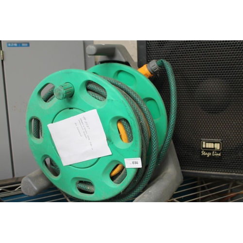 36 - GREEN AND YELLOW HOSE ON REEL