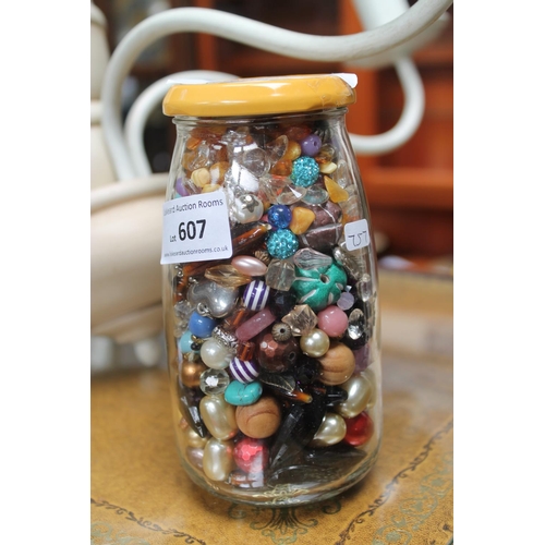 607 - JAR OF CRAFT AND AMBER BEADS