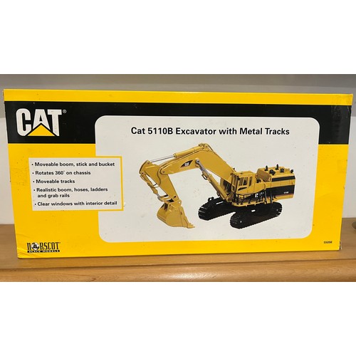 23 - NORSCOT CAT 5110B EXCAVATOR WITH METAL TRACKS 55098,
DIE CAST, 1:50,
BOXED, GREAT CONDITION