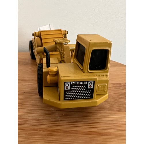 116 - ERTL, CATERPILLAR 613C ELEVATING SCRAPPER/EARTH MOVER, 1:64, DIE CAST, GOOD CONDITION, NO BOX