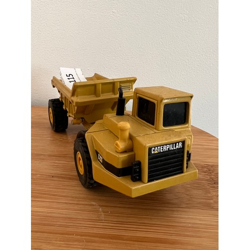 115 - ERTL, CATERPILLAR D25D ARTICULATED REAR DUMP TRUCK, 1:64, DIE CAST, GOOD CONDITION, NO BOX