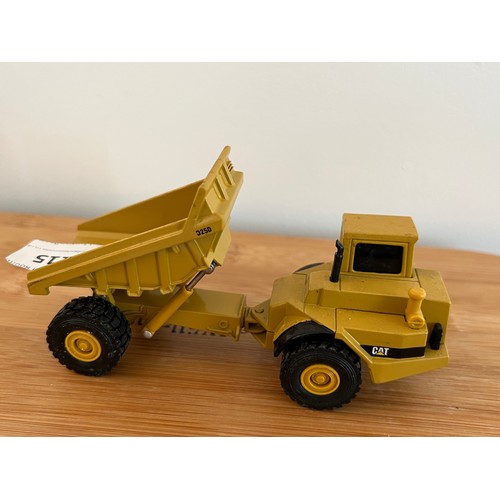 115 - ERTL, CATERPILLAR D25D ARTICULATED REAR DUMP TRUCK, 1:64, DIE CAST, GOOD CONDITION, NO BOX