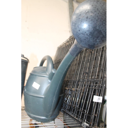 55 - LARGE WATERING CAN AND ROSE