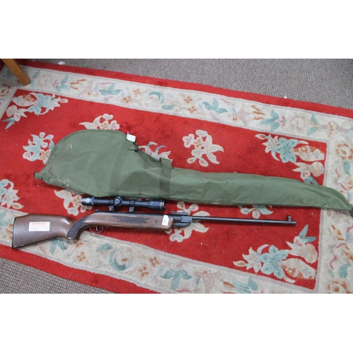 424 - .22 AIR RIFLE WITH SCOPE AND CASE