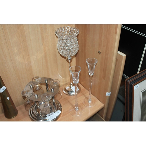 524 - SILVER PLATED WINE BOTTLE AND GLASSES HOLDER PLUS A CRYSTAL TOPPED CANDLE LIGHT AND 2 GLASS CANDLEST... 