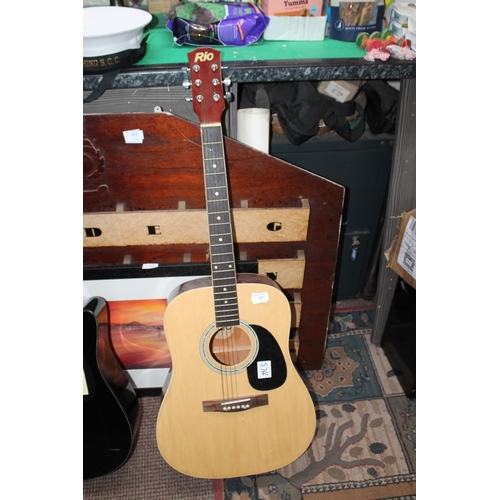 557 - 6 STRING ACOUSTIC GUITAR