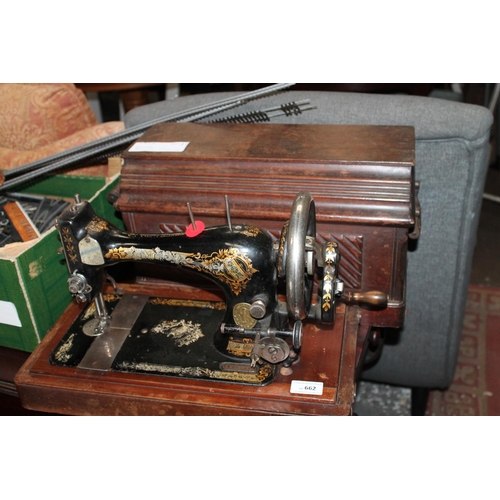 662 - ANTIQUE OAK CASED SINGER SEWING MACHINE