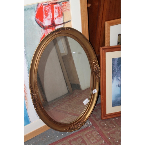 677 - ORNATE OVAL WALL MIRROR