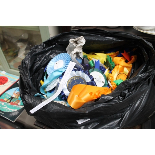 346 - BAG OF TROPHIES AND ROSETTES