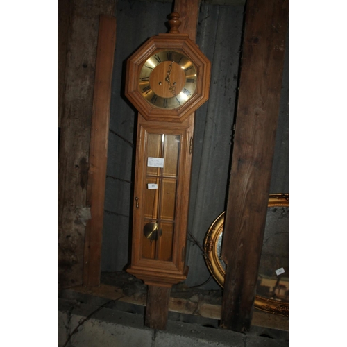 481 - OAK 8 DAY WALL CLOCK WITH KEY, PENDULUM AND IN GOOD WORKING ORDER