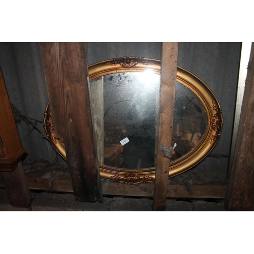 482 - GOLD FRAMED OVAL ORNATE MIRROR