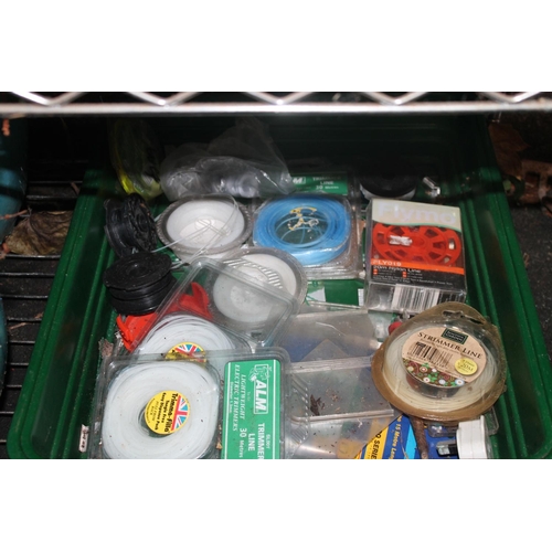 58 - CRATE OF MIXED DIAMETER STRIMMER CABLES ETC