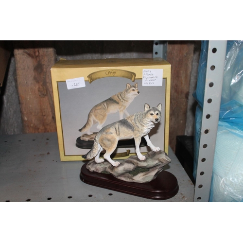 105 - BOXED FIGURINE OF A WOLF