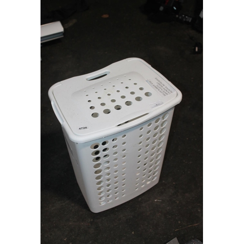 310 - SMALL WHITE LAUNDRY BASKET