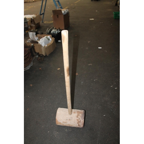 138 - A LARGE WOODEN MALLET