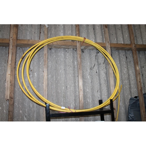 35 - LARGE LENGTH OF YELLOW PLASTIC PIPING