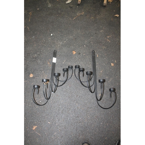 82 - PAIR OF IRON WALL CANDLE HOLDERS