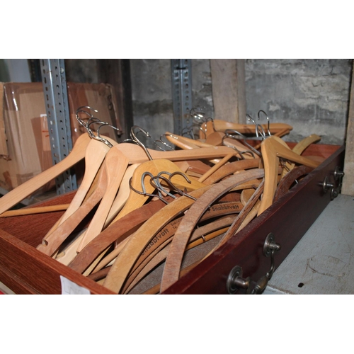 306 - DRAWER OF WOODEN COAT HANGERS (IDEAL FOR CAR BOOT SALES)