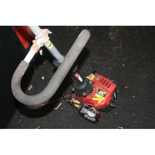 65 - ZIP START ST525 PETROL STRIMMER