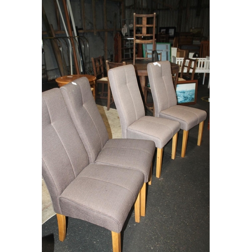 717 - FOUR COMFORTABLE PADDED DINING CHAIRS