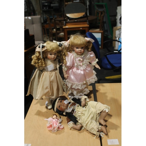 726 - THREE CERAMIC DOLLS WITH TWO ON STANDS