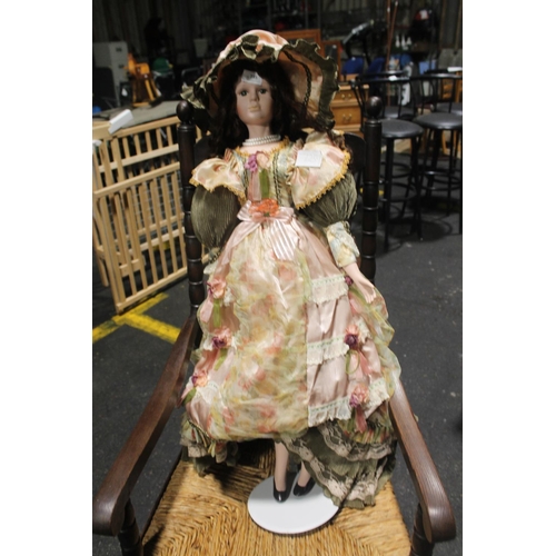 735 - TALL CERAMIC DOLL ON STAND