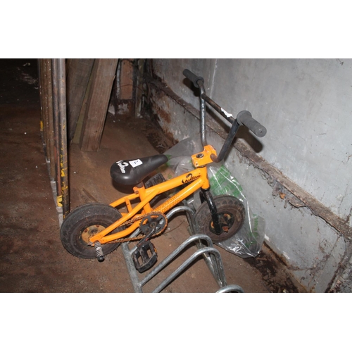 2 - CHILDS ORANGE STUNT BIKE