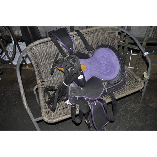 2 - BLACK AND PURPLE SUEDE TYPE FABRIC PONY SADDLE WITH CINCH BRIDLE, BREAST PLATE WITH DECORATIVE PURPL... 