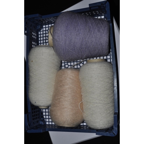 255 - 4 LARGE SPOOLS OF QUALITY WOOL