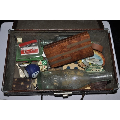 284 - SMALL SUITCASE OF VINTAGE BOTTLES, BADGES