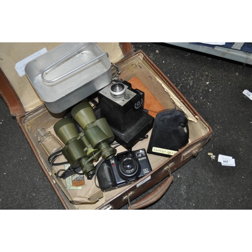 197 - LEATHER SUITCASE OF CAMERA EQUIPMENT AND BINOCULARS