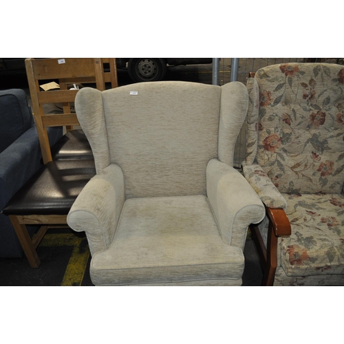 542 - CREAM UPHOLSTERED WINGBACK CHAIR