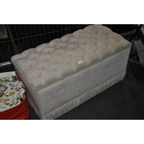 685 - BUTTON TOPPED OTTOMAN