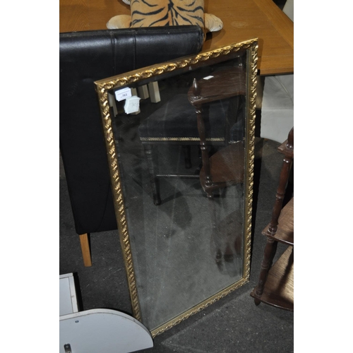 761 - HEAVY GILT WALL MIRROR