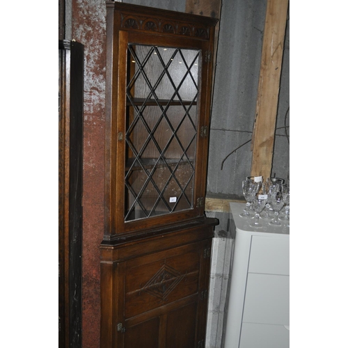 857 - CARVED OAK CORNER CABINET WITH GLAZED TOP