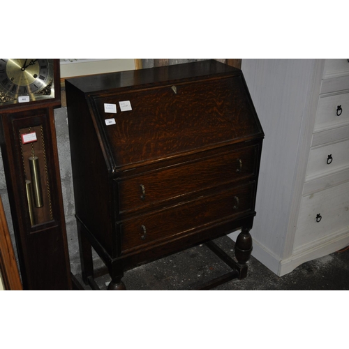 883 - OAK BUREAU WITH KEY