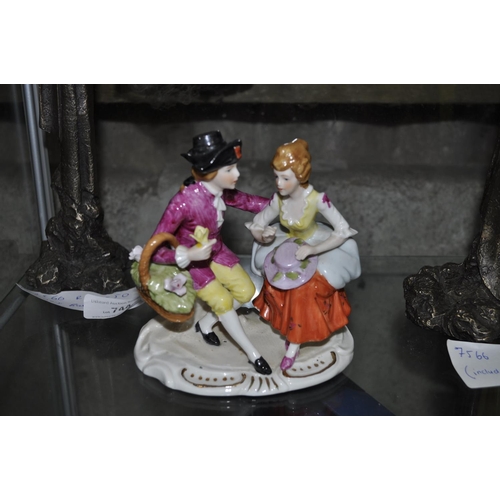 745 - VINTAGE PORCELINE FIGURE