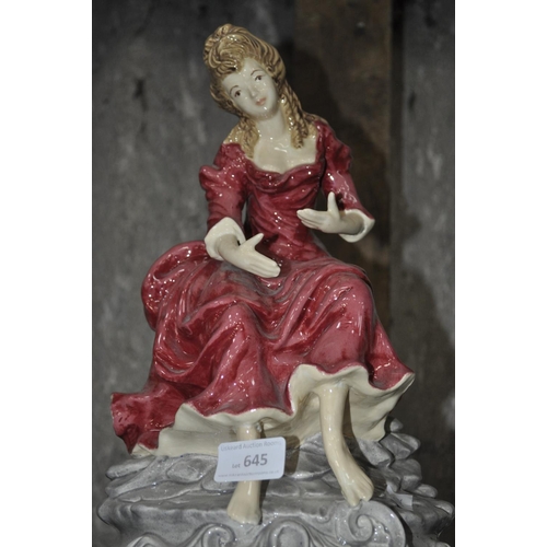 645 - LARGE HEAVY PORCELAIN FIGURINE