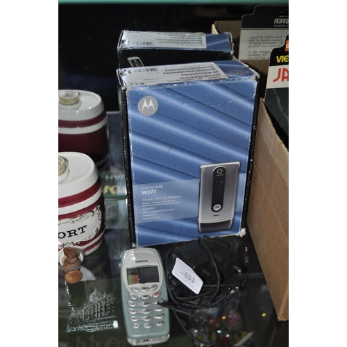 651 - BOXED MOTOROLLA FLIP PHONE AND NOKIA 3410 AND CHARGER